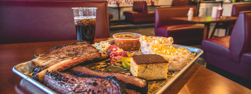 Exterior of Kafi BBQ, a halal Texas barbecue restaurant in Irving, Texas