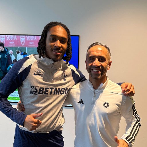 England defender Djed Spence in Tottenham training wear with mentor and former footballer Riz Rehman