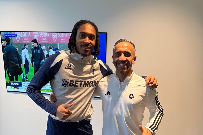 England defender Djed Spence in Tottenham training wear with mentor and former footballer Riz Rehman