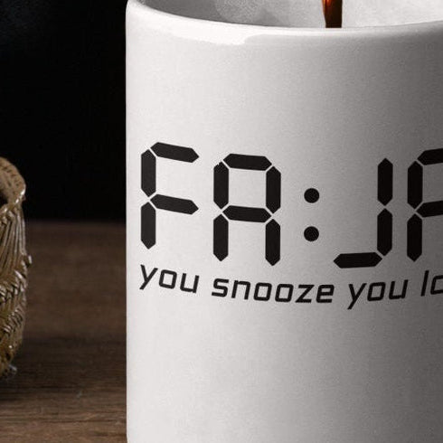 A FAJR You Snooze You Lose mug filled with morning chai