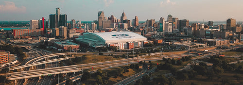Downtown Detroit skyline in daylight with Ford Field and the Renaissance Center
