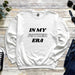 a white sweatshirt with the words in my father era printed on it