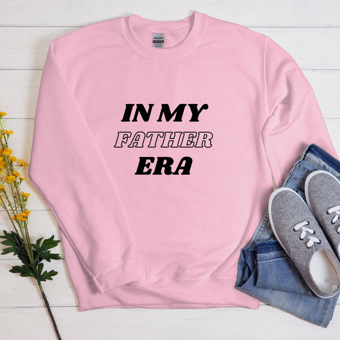 a pink sweatshirt with the words in my father era on it