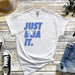 a t - shirt that says just dua it