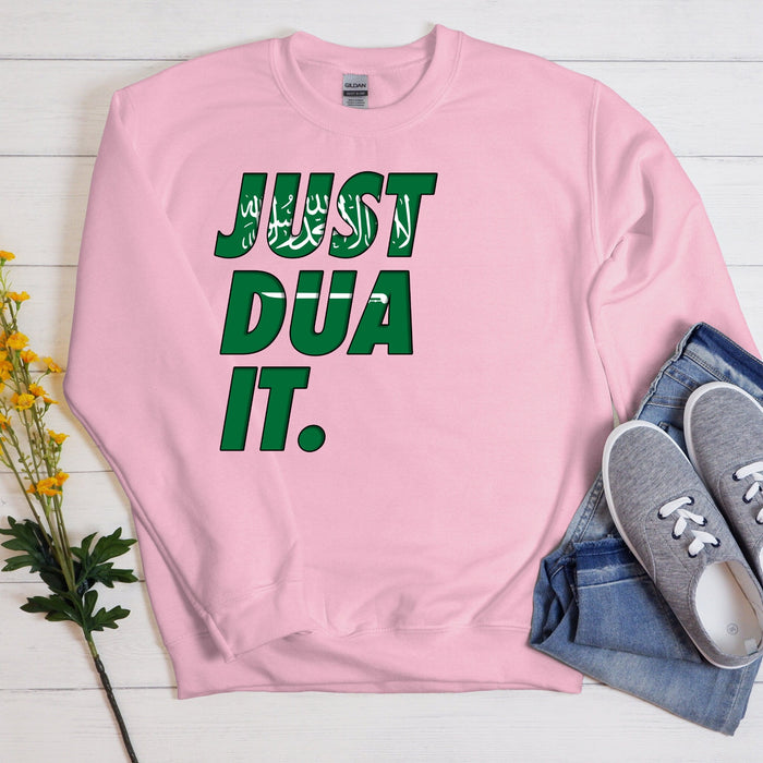 a pink sweatshirt that says just dua it