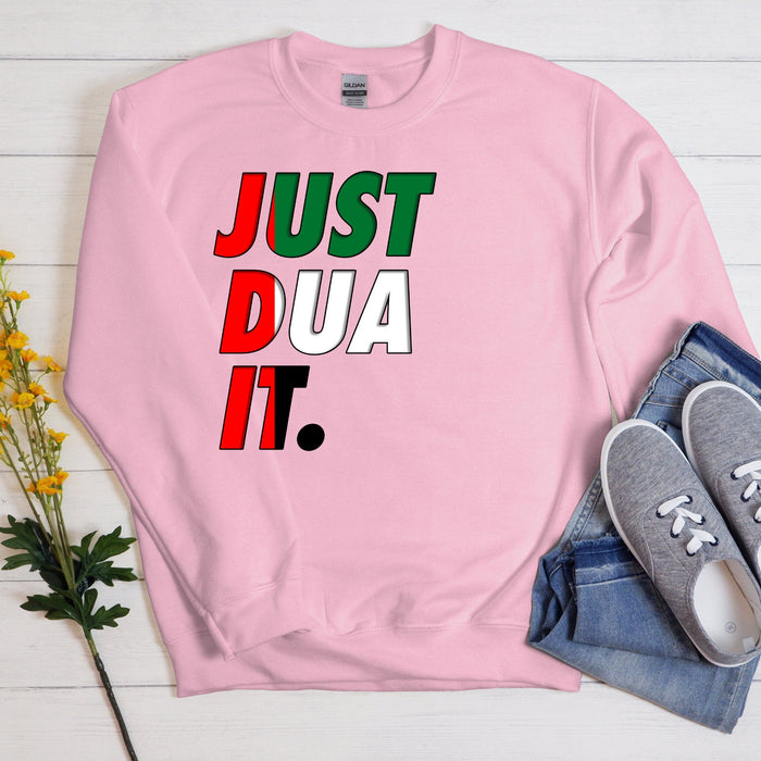 a pink sweatshirt with the words just dua it on it