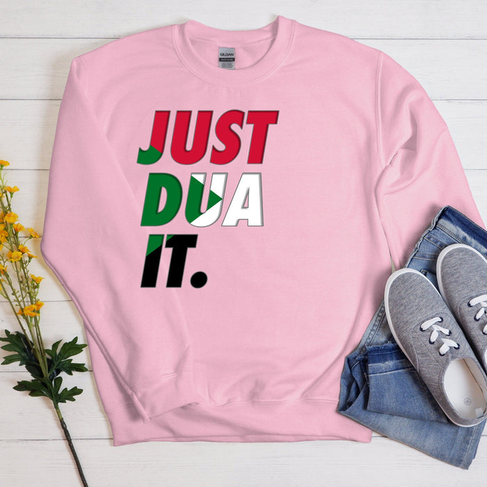 a pink sweatshirt that says just dua it